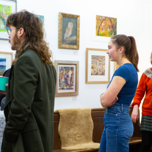 Visitors at an art exhibition