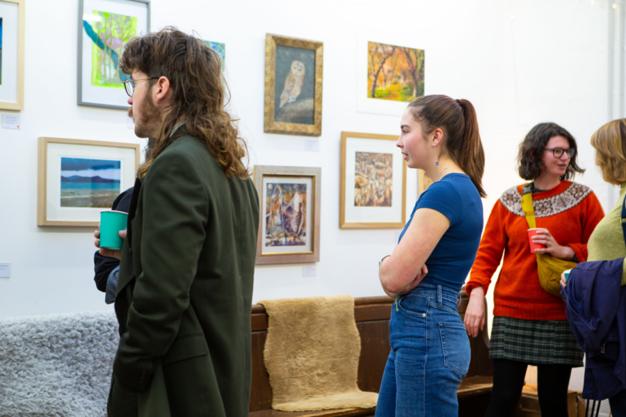 Visitors at an art exhibition